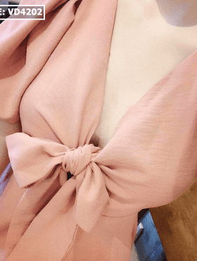 Đầm hồng xòe vải đũi cột nơ tay phồng