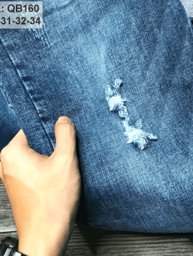 Quần jean nam cao cấp màu xanh rách nhẹ